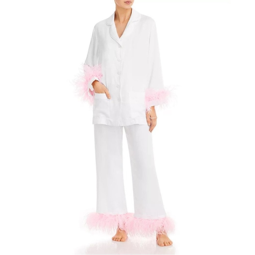 Sleeper pajamas. White with pink feathers. Warn once on wedding morning!